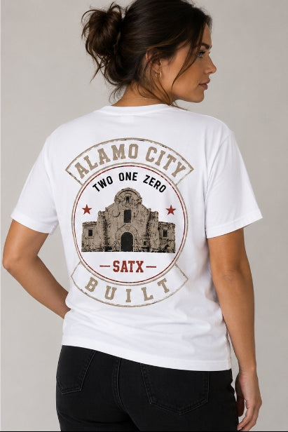 Women's white Alamo City Built tee back featuring SATX and Alamo illustration