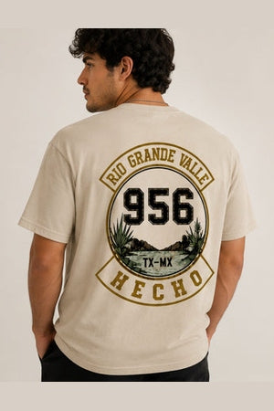 Back view beige t-shirt featuring 956 area code and TX-MX landscape graphic